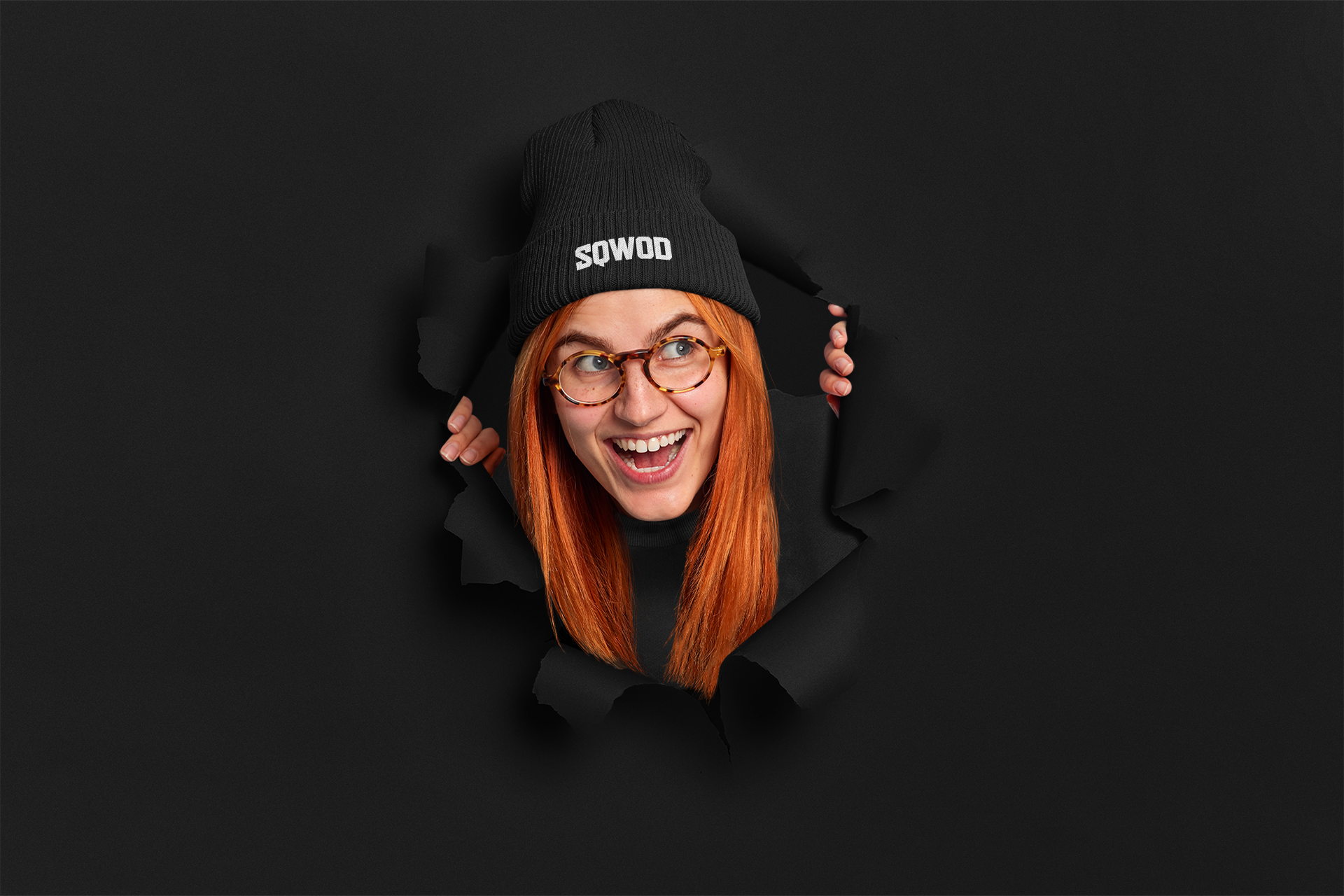 Happy Sqwod woman bursting through canvas