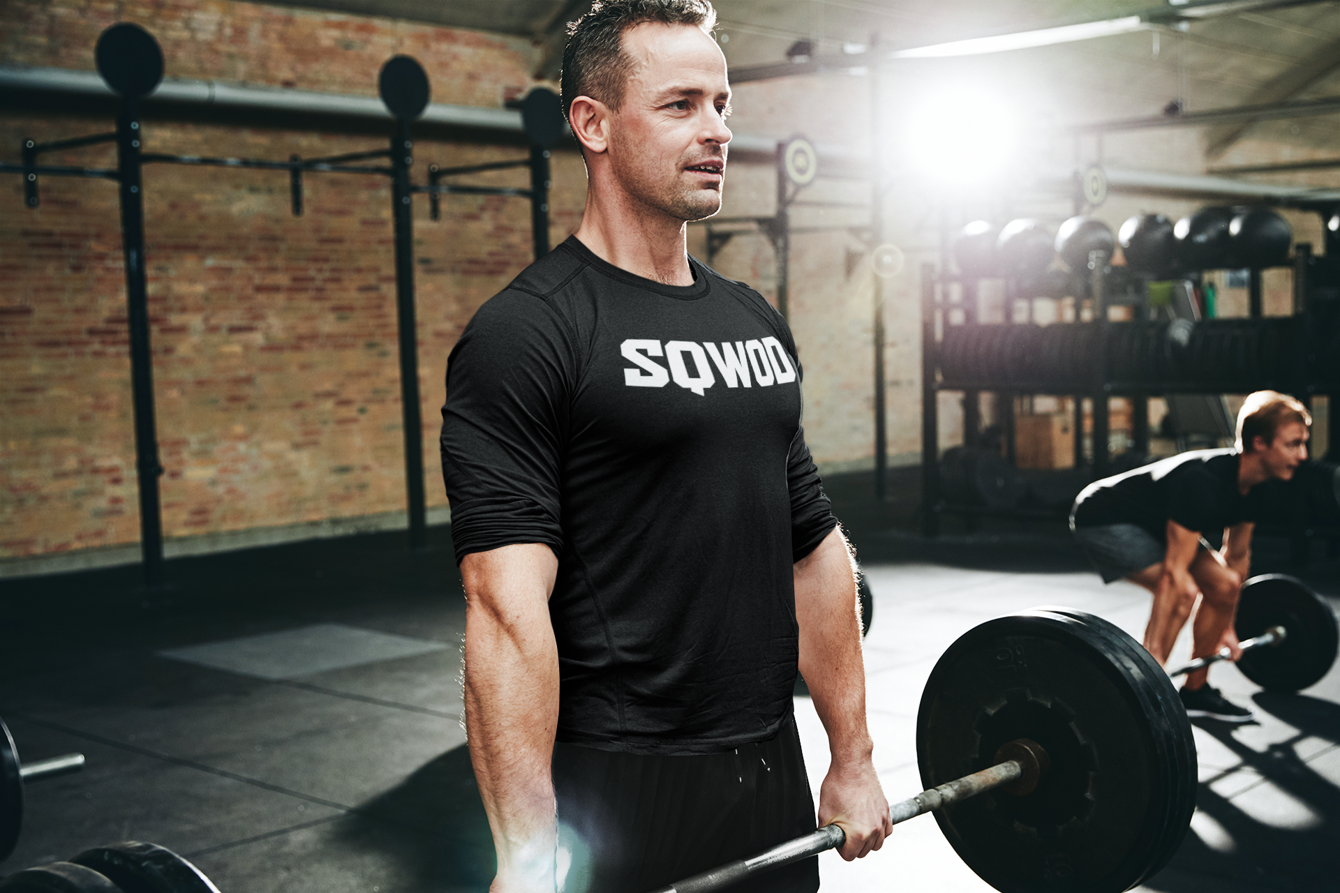 Sqwod gym coach lifting weights content creation seo